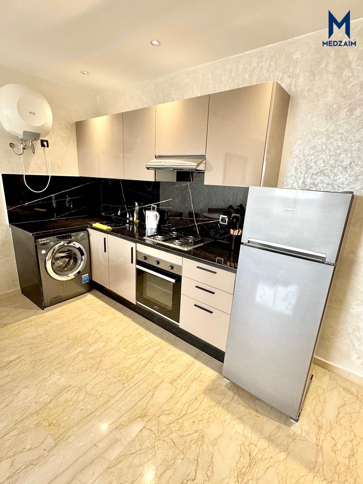 Cuisine équipée — Studio meublé de 52 m², Oasis